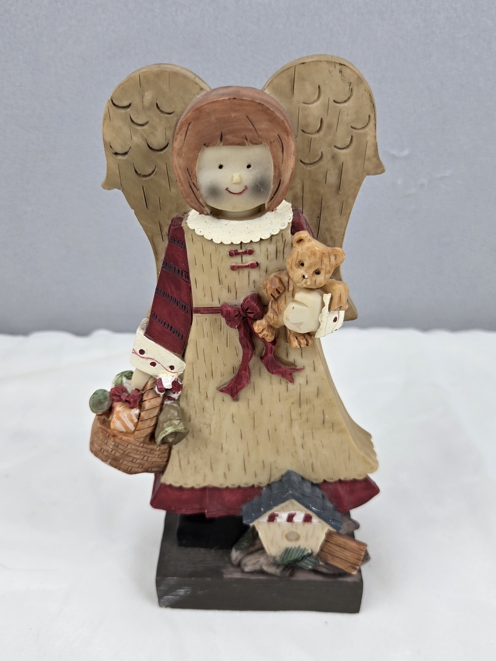 Handcrafted Beige and Red Angel Figurine Holiday Decor